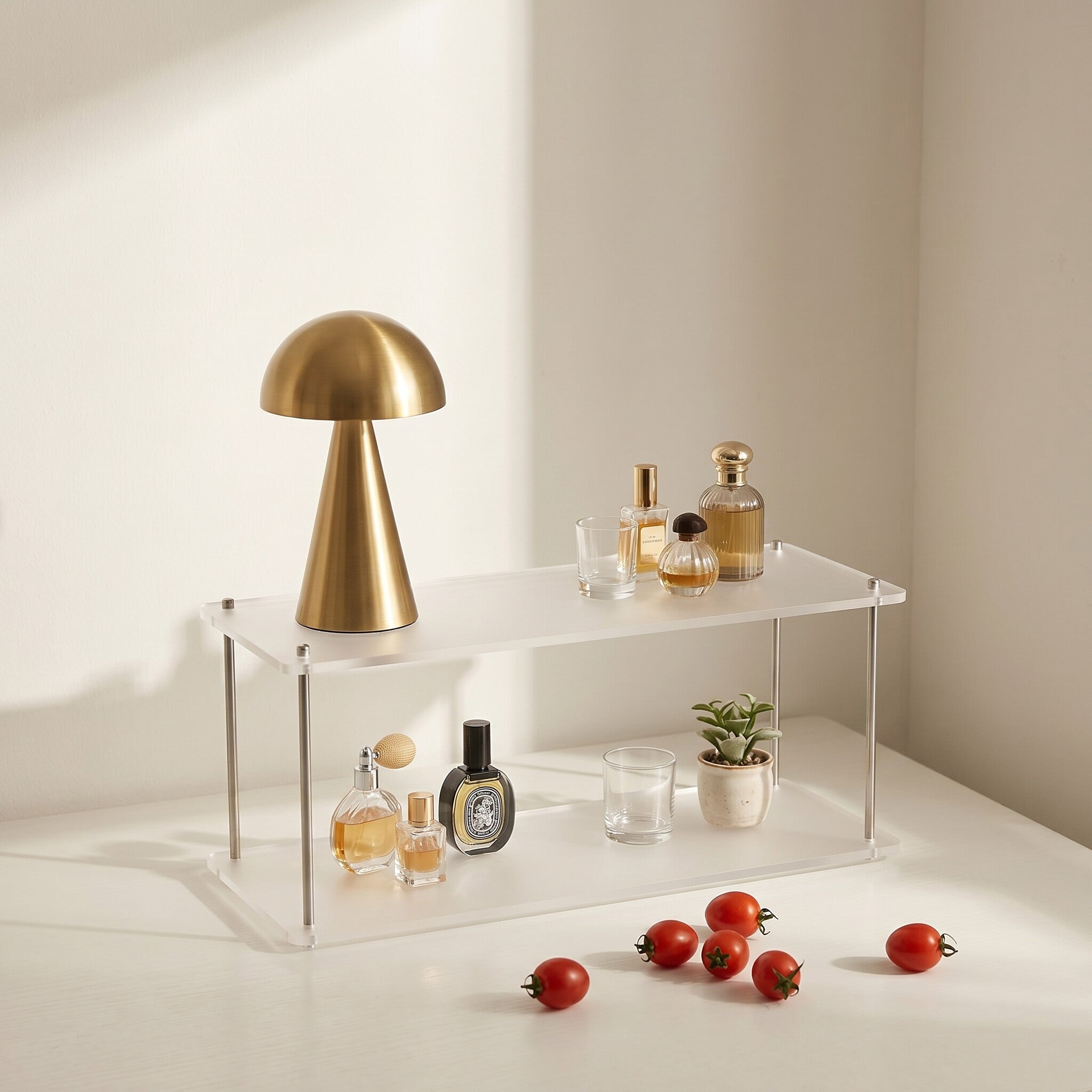 Minimalist acrylic display shelf for cups and cosmetics.